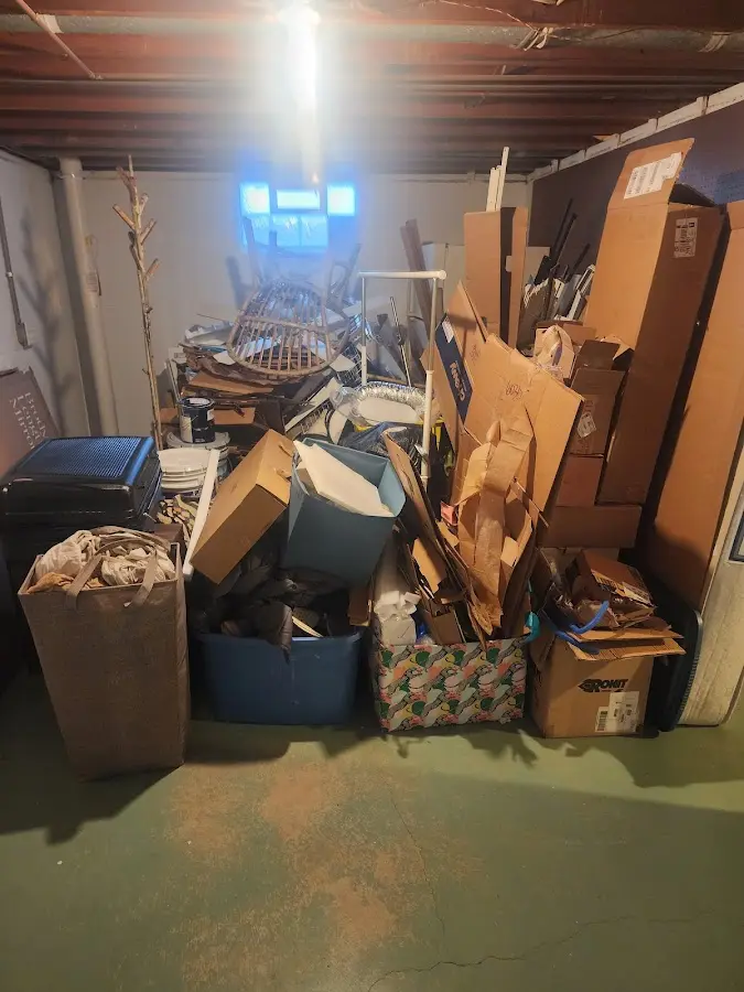 Roll-off dumpster container at job site for 2 Yard Dumpster Rental in Ann Arbor